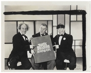 Moe Howard's ''Three Stooges Scrapbook'' & 2 Photos of the Stooges Holding Up one of the Scrapbooks on Their Show -- 17.5'' x 24.5'' Empty Book Has Moe's Name Stamped at Lower Right -- Damage to Spine